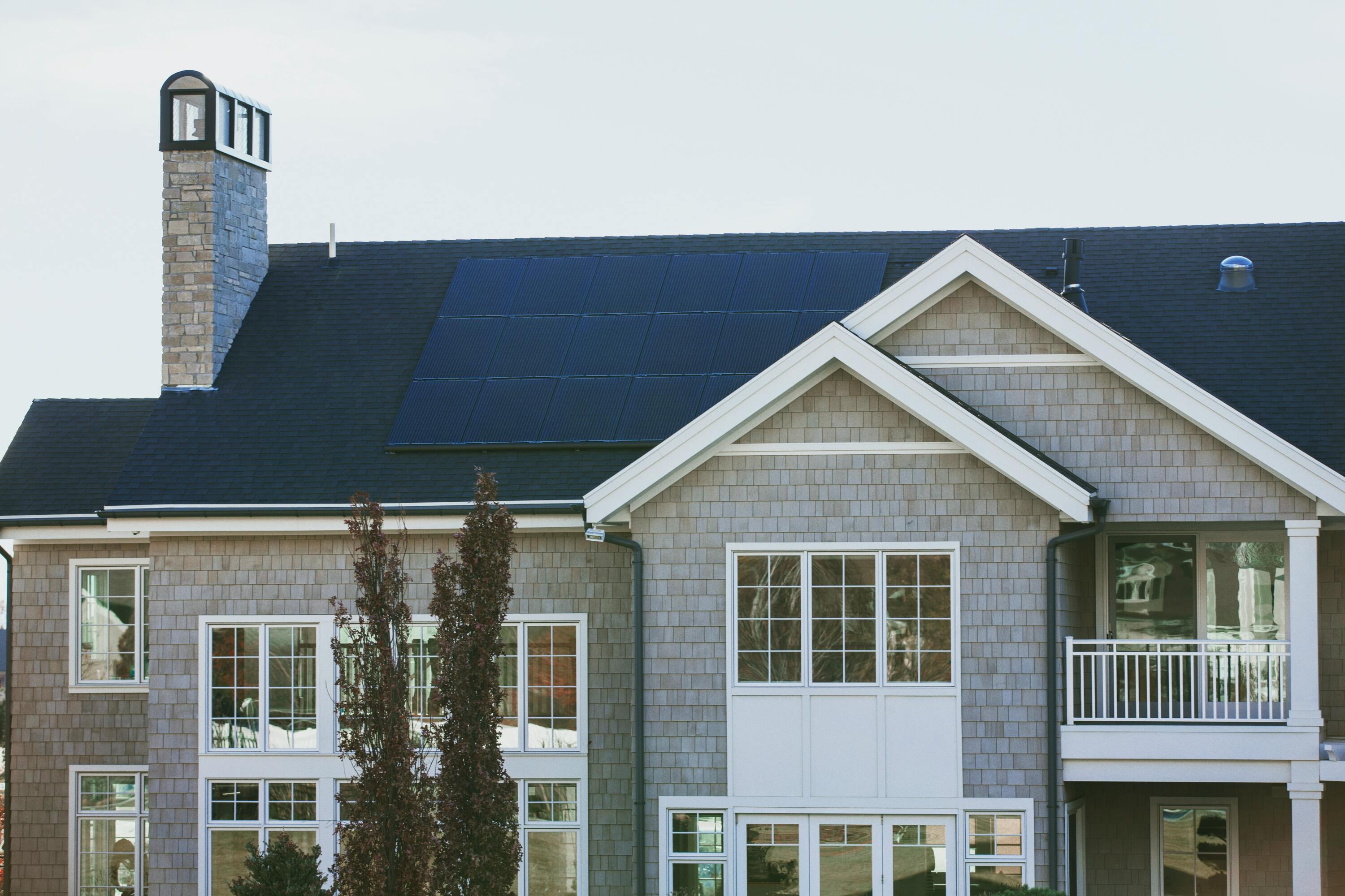 a home with solar panel system installed on the roof